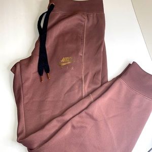 Nike sweatpants rose gold